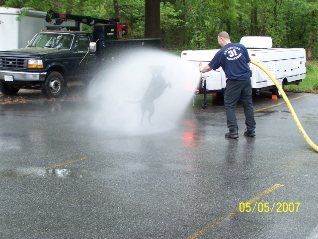 Chuck and Raven washing the parking lot